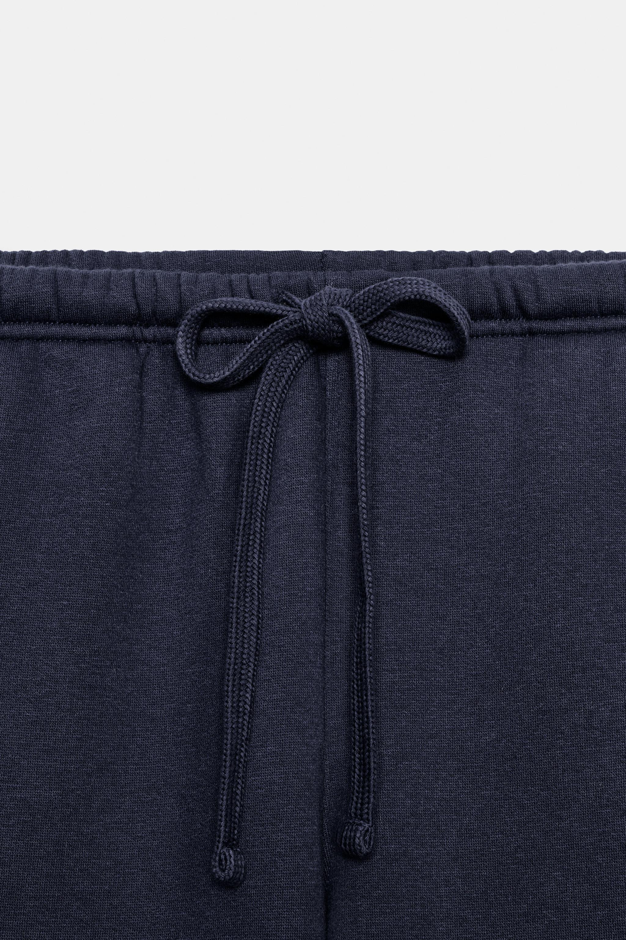 PANTALON EN MOLLETON BASIQUE DROIT À BAS AJUSTABLE